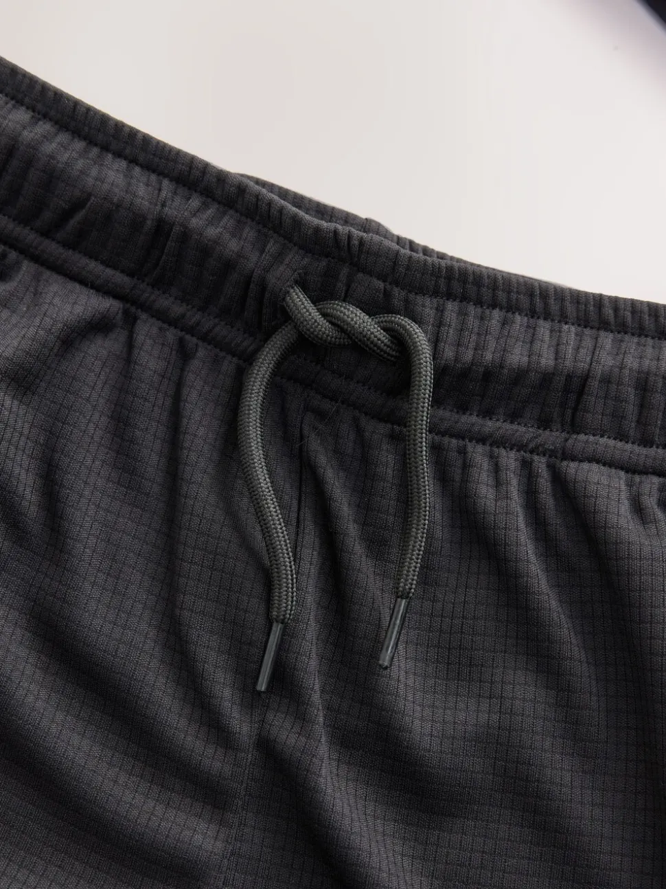 Zwart - Sportset van T-shirt en short (3-16 jr)