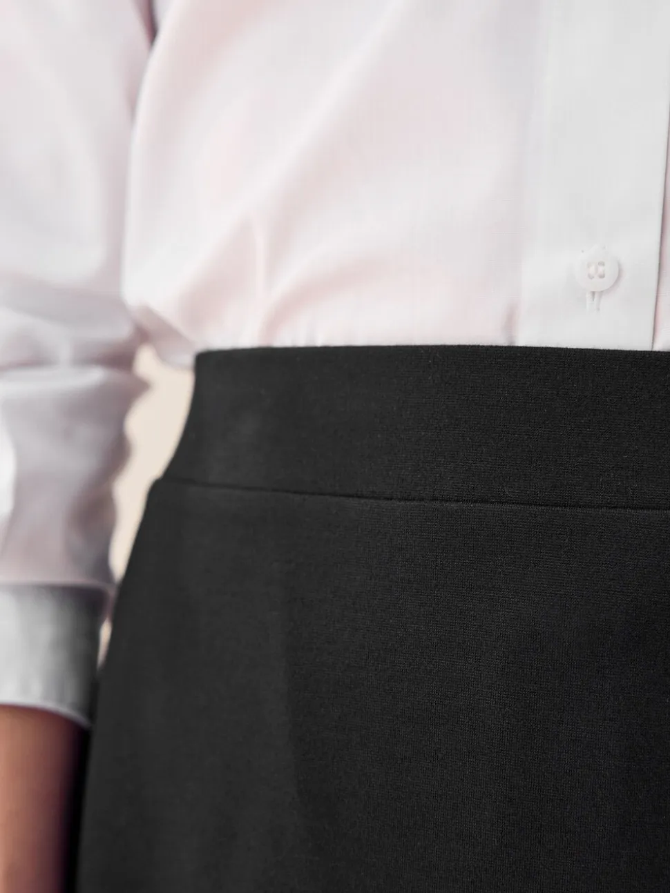 Zwart - Stretchkokerrok van jersey met elastische taille voor senioren (9-18jr)