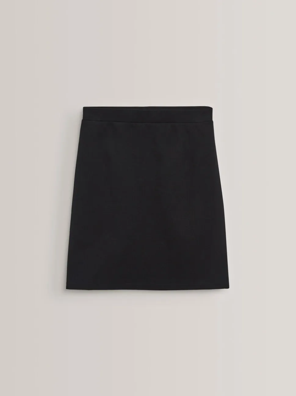 Zwart - Stretchkokerrok van jersey met elastische taille voor senioren (9-18jr)