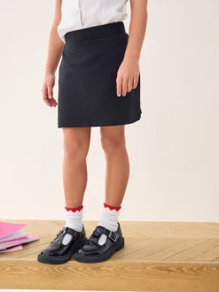 Zwart - Stretchy katoenen jersey schoolschort (3 - 16 jr)