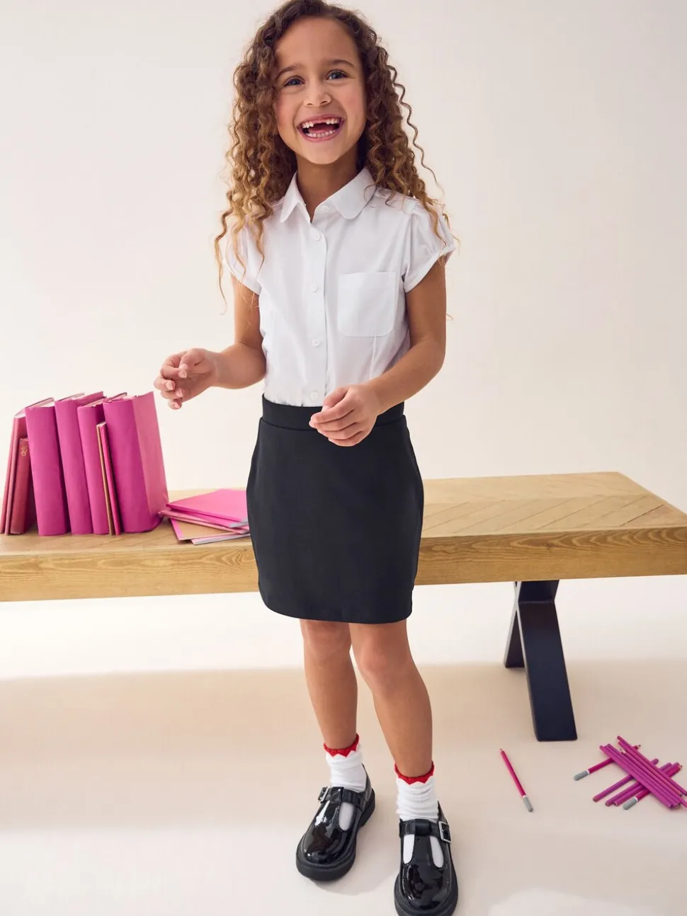 Zwart - Stretchy katoenen jersey schoolschort (3 - 16 jr)
