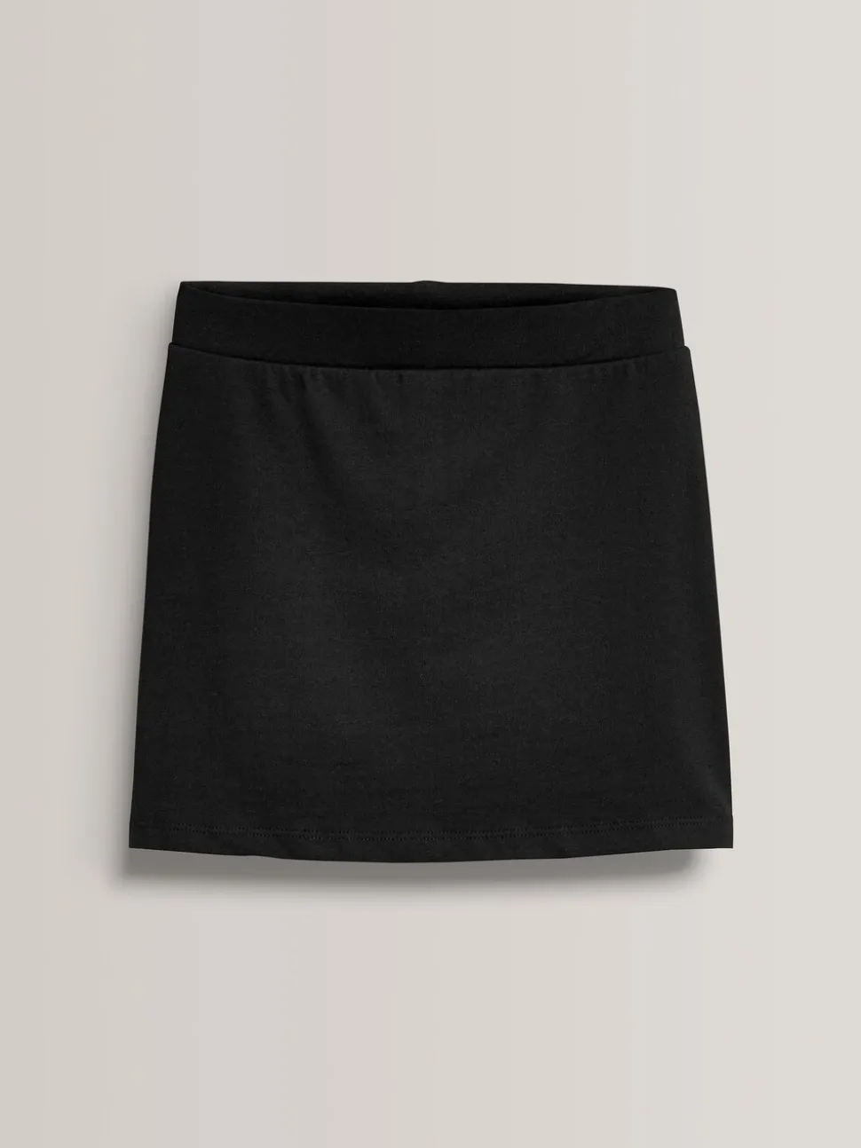 Zwart - Stretchy katoenen jersey schoolschort (3 - 16 jr)