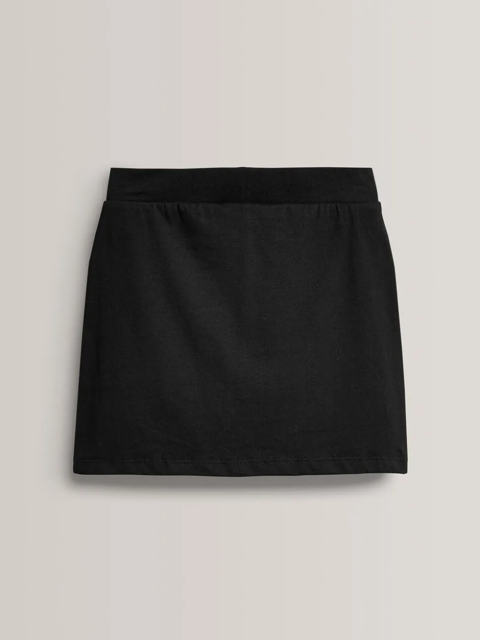 Zwart - Stretchy katoenen jersey schoolschort (3 - 16 jr)