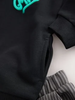 Zwart en grijs bedrukt - Set met hoodie en timmermansjoggingbroek (3 mnd - 7 jr)