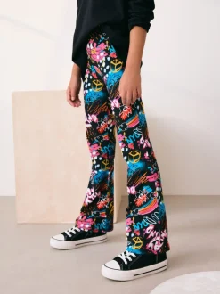 Zwart graffiti - Uitlopende legging (3-16jr)