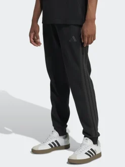 Zwart Ground - adidas Essentials fleece joggingbroek met 3 strepen