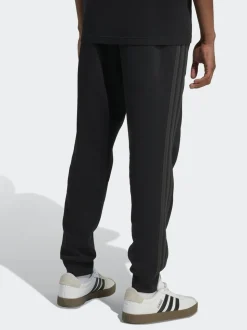 Zwart Ground - adidas Essentials fleece joggingbroek met 3 strepen