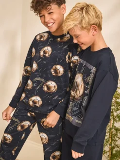 Zwart met goudkleurige voetbal - Verpakking van 2 pyjama's met lange mouwen (3-16 jr)