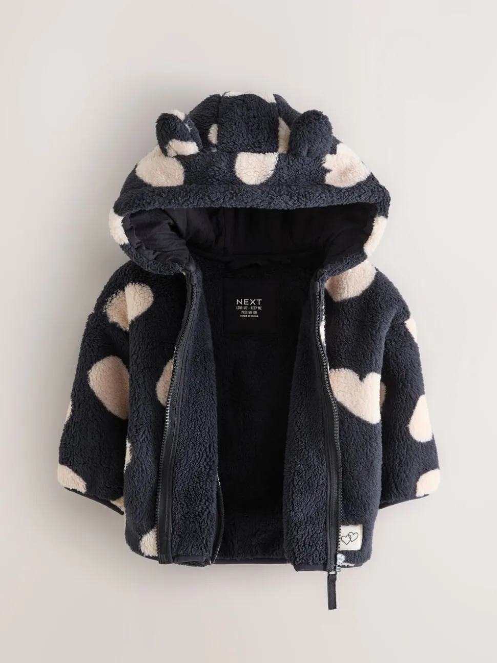 Zwart met hartjesprint - Fleece met ritssluiting (3mnd-7jr)