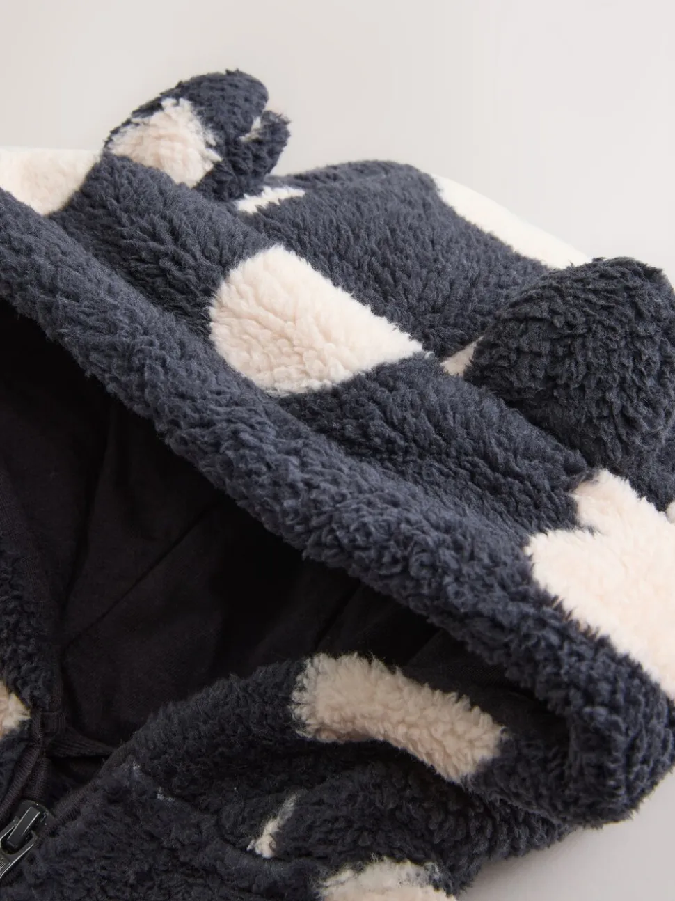 Zwart met hartjesprint - Fleece met ritssluiting (3mnd-7jr)