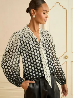 Zwart met hartjesprint - Love & Roses blouse met lange mouwen en striksluiting