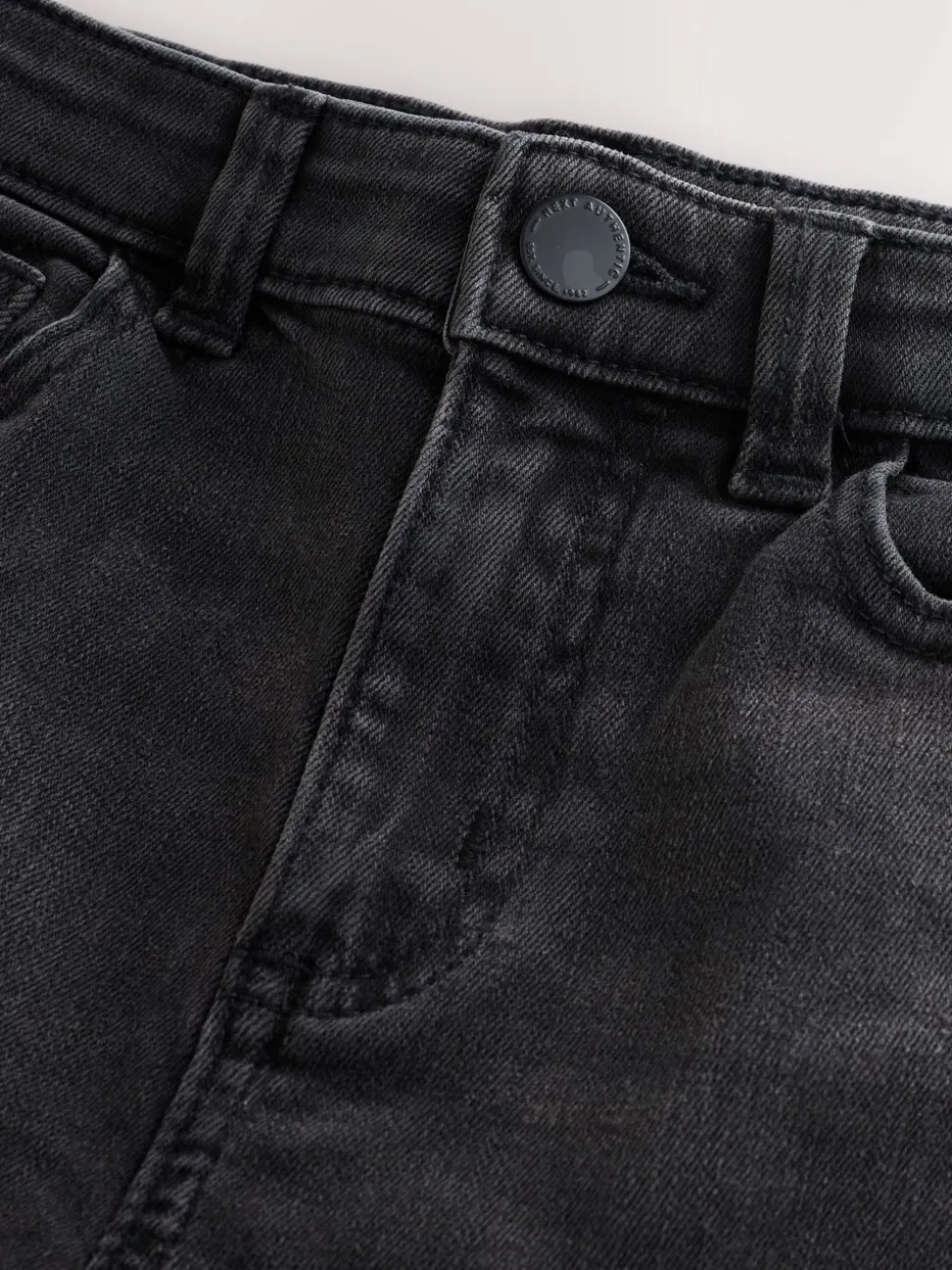 Zwarte wassing - Stretchjeans (3-17jr)