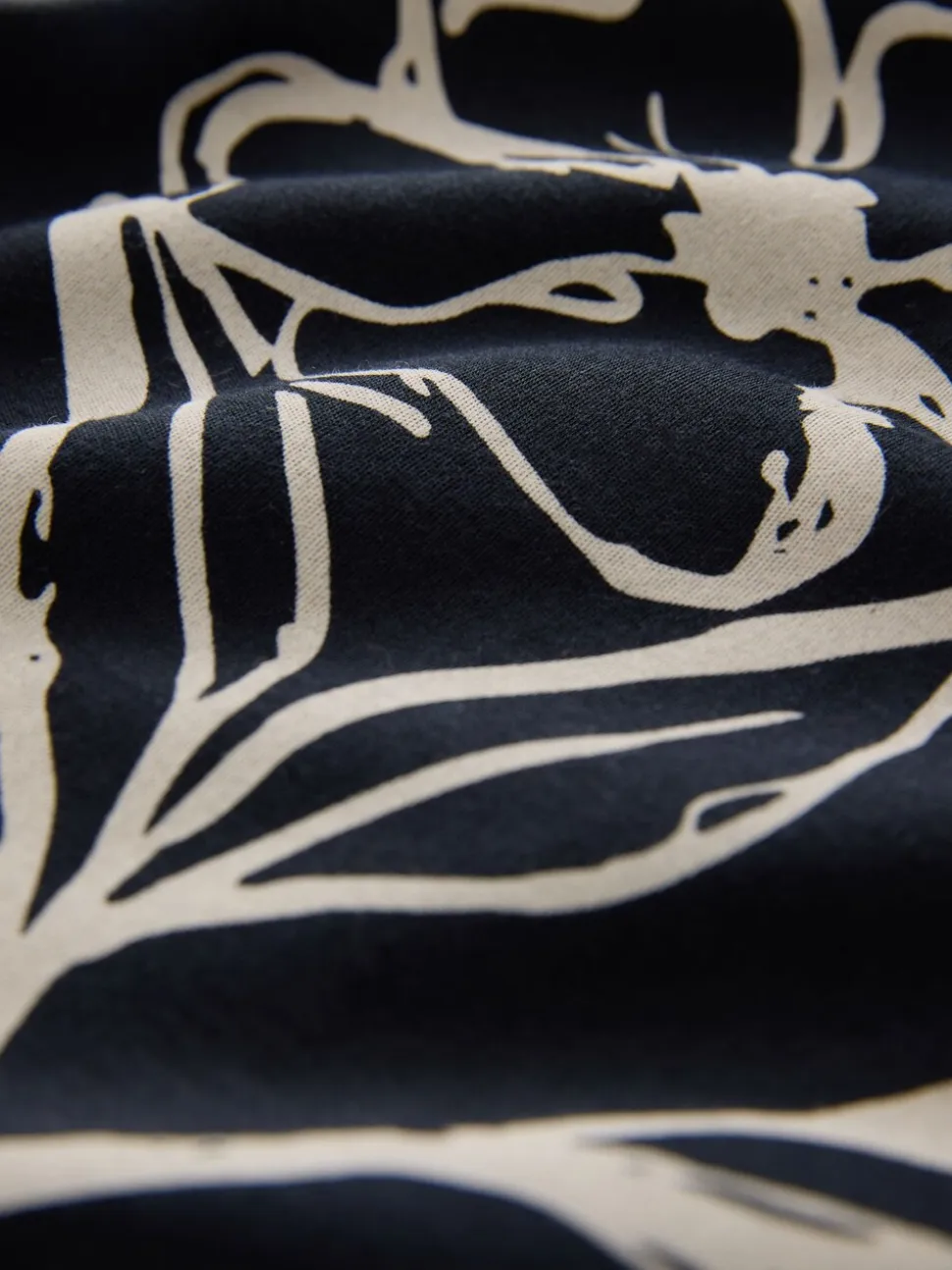 Zwartgoud met bloemenprint - Poloshirt met korte mouwen en print