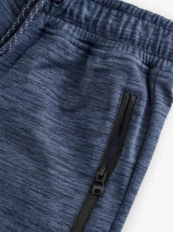 Zwart/marineblauw - Slim-fit joggingbroek met ritszak (3-16jr)