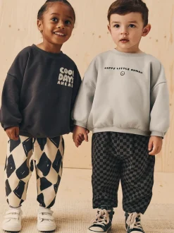 Zwart/wit met print - Set met sweatshirt en joggingbroek met strepen (3mnd-7jr)
