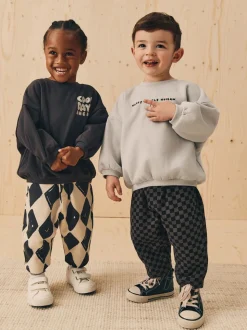 Zwart/wit met print - Set met sweatshirt en joggingbroek met strepen (3mnd-7jr)