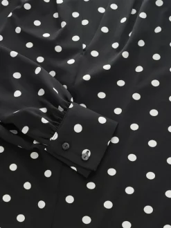 Zwart-wit met stippen - Blouse met V-hals en lange mouwen